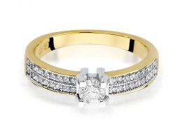 ekskluzywny pierścionek złoty zaręczynowy z brylantami diamentami szeroka szyna gruby szeroki złoto żółte pierścionek na palcu ręce