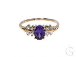 złoty pierścionek z fioletową cyrkonią pierścionek zaręczynowy