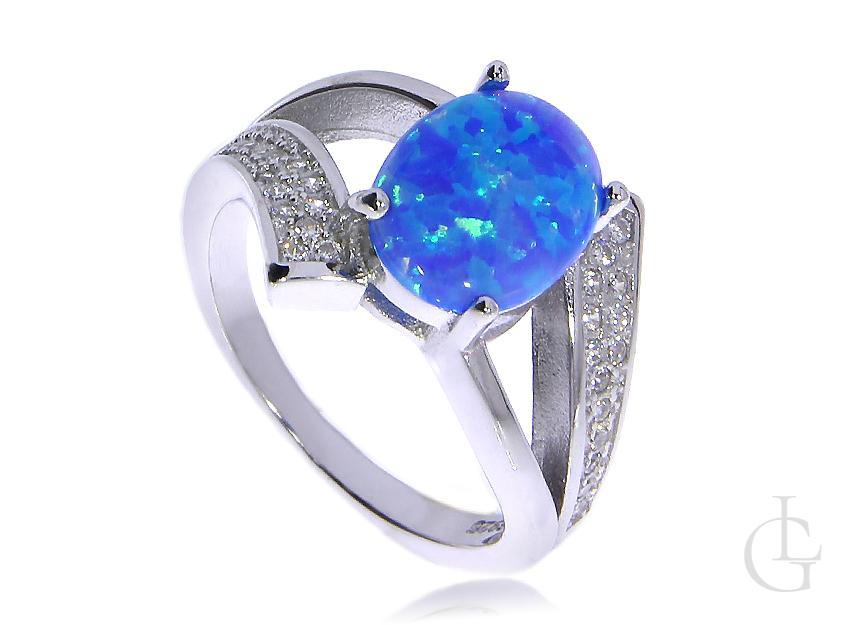 Prześliczny pierścionek ze srebra rodowanego pr.0,925 z opalem błękitnym i cyrkoniami