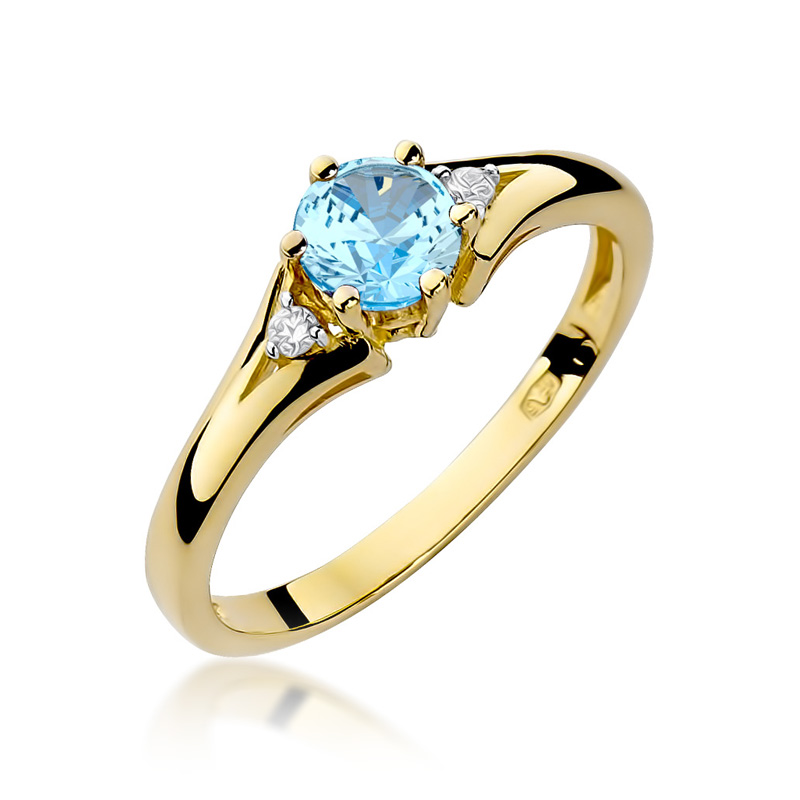 Złoty pierścionek zaręczynowy z brylantami i topazem błękitnym