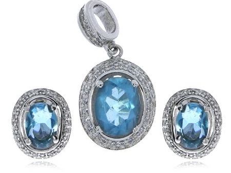Komplet biżuterii ze srebra rodowanego pr.0,925 z cyrkoniami klasycznymi i w kolorze topazu błękitnego