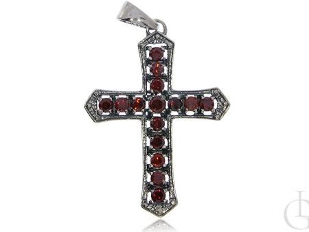 Krzyżyk ze srebra pr.0,925 z rubinowymi cyrkoniami